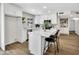 Modern kitchen with white cabinets, quartz countertops and stainless appliances at 156 E Jasmine St, Mesa, AZ 85201