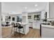 Modern kitchen with an island, white cabinets and stainless steel appliances at 156 E Jasmine St, Mesa, AZ 85201