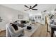 Open concept living room featuring stylish decor and hardwood flooring at 156 E Jasmine St, Mesa, AZ 85201