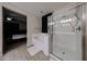 This bathroom features a soaking tub and separate glass enclosed shower at 16930 W Woodlands Ave, Goodyear, AZ 85338