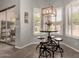Bright breakfast nook featuring modern lighting and counter seating by large windows at 1884 E Stephens Dr, Tempe, AZ 85283