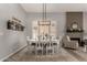 Charming dining area featuring a decorative light fixture and lovely natural light at 1884 E Stephens Dr, Tempe, AZ 85283
