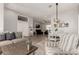 Spacious living room with neutral color palette, and comfortable seating arrangement at 1884 E Stephens Dr, Tempe, AZ 85283
