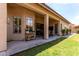 Inviting covered patio with ample seating, perfect for outdoor relaxation and entertaining at 1884 E Stephens Dr, Tempe, AZ 85283
