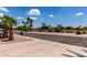 Street view showcasing the landscaped neighborhood with a view of the pond at 1884 E Stephens Dr, Tempe, AZ 85283