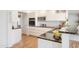 Modern kitchen with stainless steel appliances, sleek countertops, and ample cabinet space at 19030 N Signal Butte Cir, Sun City, AZ 85373
