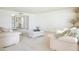 Spacious living room with neutral tones and ample seating at 19030 N Signal Butte Cir, Sun City, AZ 85373