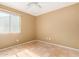 Bright bedroom featuring tile flooring, a white ceiling fan and ample lighting at 1926 E Sandra Ter, Phoenix, AZ 85022