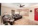 Comfortable living room showcases terracotta flooring, natural light, and stylish furnishings at 1926 E Sandra Ter, Phoenix, AZ 85022