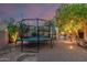 Spacious backyard with a trampoline and outdoor seating at 194 E Canyon Creek Dr, Gilbert, AZ 85295