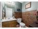 Traditional bathroom features updated vanity, framed mirror, and decorative tiled walls at 194 E Canyon Creek Dr, Gilbert, AZ 85295