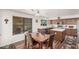 Inviting dining area adjacent to the kitchen, featuring a wood table and kitchen views at 194 E Canyon Creek Dr, Gilbert, AZ 85295