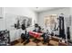 Exercise room includes floor to ceiling mirror and workout equipment at 194 E Canyon Creek Dr, Gilbert, AZ 85295