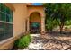 Inviting front porch and walkway, featuring beautiful landscaping and a covered entrance, creating a welcoming approach at 194 E Canyon Creek Dr, Gilbert, AZ 85295