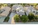 Expansive aerial view of a house featuring solar panels, a well-maintained lawn, and a spacious driveway at 2556 E Quiet Hollow Ln, Phoenix, AZ 85024
