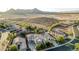 Panoramic aerial view showcasing the neighborhood and surrounding desert landscape at 2556 E Quiet Hollow Ln, Phoenix, AZ 85024