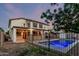 This property features a fenced backyard oasis with a sparkling private pool and covered patio at 2556 E Quiet Hollow Ln, Phoenix, AZ 85024