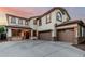 Charming two-story home with a three-car garage, beautiful windows, and a well-maintained yard at 2556 E Quiet Hollow Ln, Phoenix, AZ 85024