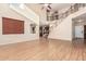 Bright living area with staircase, natural light, and open access to the kitchen at 2556 E Quiet Hollow Ln, Phoenix, AZ 85024