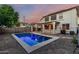 This property features a fenced backyard oasis with a sparkling private pool at 2556 E Quiet Hollow Ln, Phoenix, AZ 85024