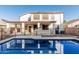 Backyard pool with covered patio, perfect for outdoor relaxation and entertaining at 2556 E Quiet Hollow Ln, Phoenix, AZ 85024