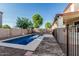 Backyard pool with covered patio, perfect for relaxation and enjoying outdoor living at 2556 E Quiet Hollow Ln, Phoenix, AZ 85024