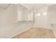 Walk-in closet with carpeted floor and multiple rods and shelves for organizing clothes at 2556 E Quiet Hollow Ln, Phoenix, AZ 85024