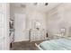 Bedroom with a large dresser and mirror, and a door leading to a closet at 2618 E Stacey Rd, Gilbert, AZ 85298