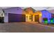 View of a single-story home with a spacious driveway and an attached two car garage at 2618 E Stacey Rd, Gilbert, AZ 85298