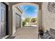Welcoming front porch with seating area and view of the driveway and street at 2618 E Stacey Rd, Gilbert, AZ 85298