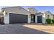 Spacious attached garage with extended driveway and easy access at 2618 E Stacey Rd, Gilbert, AZ 85298