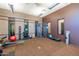 Well-equipped gym featuring weights, machines and a spacious exercise area at 2618 E Stacey Rd, Gilbert, AZ 85298