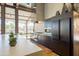 Modern kitchen showcasing stainless steel appliances, a large island, and lots of storage at 2618 E Stacey Rd, Gilbert, AZ 85298