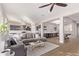 Open-concept living area connecting to a modern kitchen and stylish game room at 2618 E Stacey Rd, Gilbert, AZ 85298