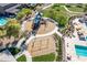 Community playground including climbing features, swings and seating at 2618 E Stacey Rd, Gilbert, AZ 85298