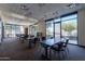 Bright study room offering a quiet space with tables and chairs for focusing on work at 2618 E Stacey Rd, Gilbert, AZ 85298
