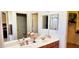 Bathroom vanity with dual sinks and large mirrors at 2894 N Paisley Ave, Casa Grande, AZ 85122