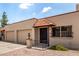 Charming single-story townhome with a well-manicured front yard and desert landscaping at 440 S Parkcrest -- # 145, Mesa, AZ 85206