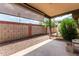The patio area features privacy walls, gravel landscaping, and mature trees, offering a serene outdoor space at 440 S Parkcrest -- # 145, Mesa, AZ 85206