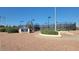 Sunland Village tennis courts, surrounded by lush desert landscaping and featuring well-maintained courts at 440 S Parkcrest -- # 145, Mesa, AZ 85206