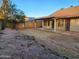 View of the backyard, patio, and block wall; includes xeriscaping at 4534 E Villa Maria Dr, Phoenix, AZ 85032