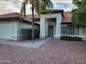 Attractive home exterior boasting a tiled roof and tidy desert landscaping leading to a bright entryway at 4534 E Villa Maria Dr, Phoenix, AZ 85032