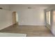 Spacious living room with modern finishes, including a ceiling fan, and access to natural light at 4534 E Villa Maria Dr, Phoenix, AZ 85032