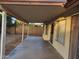 Covered back patio featuring columns, with a view of the backyard and block wall at 4534 E Villa Maria Dr, Phoenix, AZ 85032