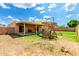 Large backyard with covered patio and play structure, great for Gathering fun at 4802 W Hayward Ave, Glendale, AZ 85301
