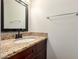 Bathroom featuring granite vanity and modern fixtures at 4802 W Hayward Ave, Glendale, AZ 85301