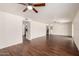 Spacious living room with hardwood floors and ceiling fan at 4802 W Hayward Ave, Glendale, AZ 85301