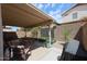 Outdoor patio with a picnic table, potted plants and a mosaic privacy screen at 4912 W Marco Polo Rd, Glendale, AZ 85308