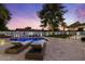 Enjoy the desert evenings next to the beautiful pool and lounging area in this relaxing backyard at 5309 E Hearn Rd, Scottsdale, AZ 85254