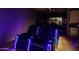 Home theater room with reclining seats, ambient lighting, projector and media equipment for a great experience at 5309 E Hearn Rd, Scottsdale, AZ 85254